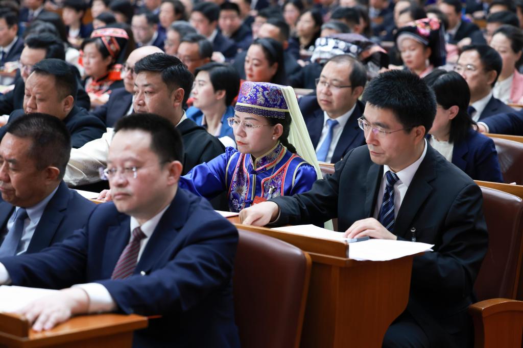 3月11日，第十四屆全國人民代表大會第二次會議在北京人民大會堂舉行閉幕會。新華社記者 王曄 攝